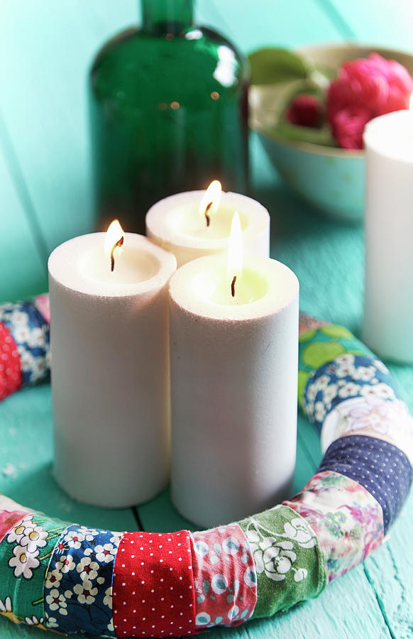 Advent Wreath Handmade From Fabric Remnants With Three Lit Candles Photograph by Nicoline Olsen