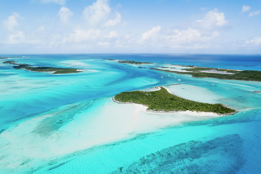 Aerial Of Sailboats Anchored In Turquoise Waters Between Islands ...