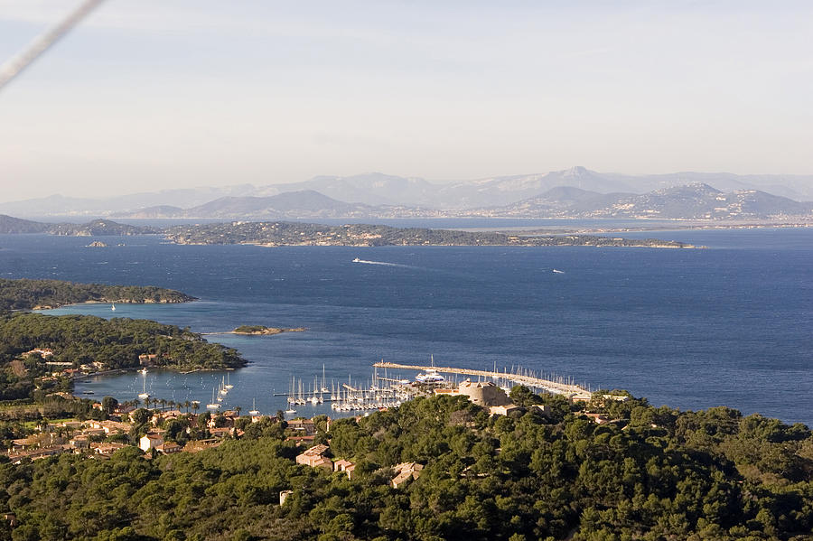 Aerial View Of A Seaport And Coastline, Porquerolles, Iles Dhyeres, France, Europe Photograph by Ulla Lohmann