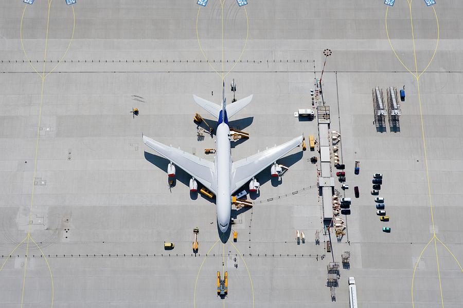 Aerial View Of Airplane On Tarmac Photograph by Stephan Zirwes