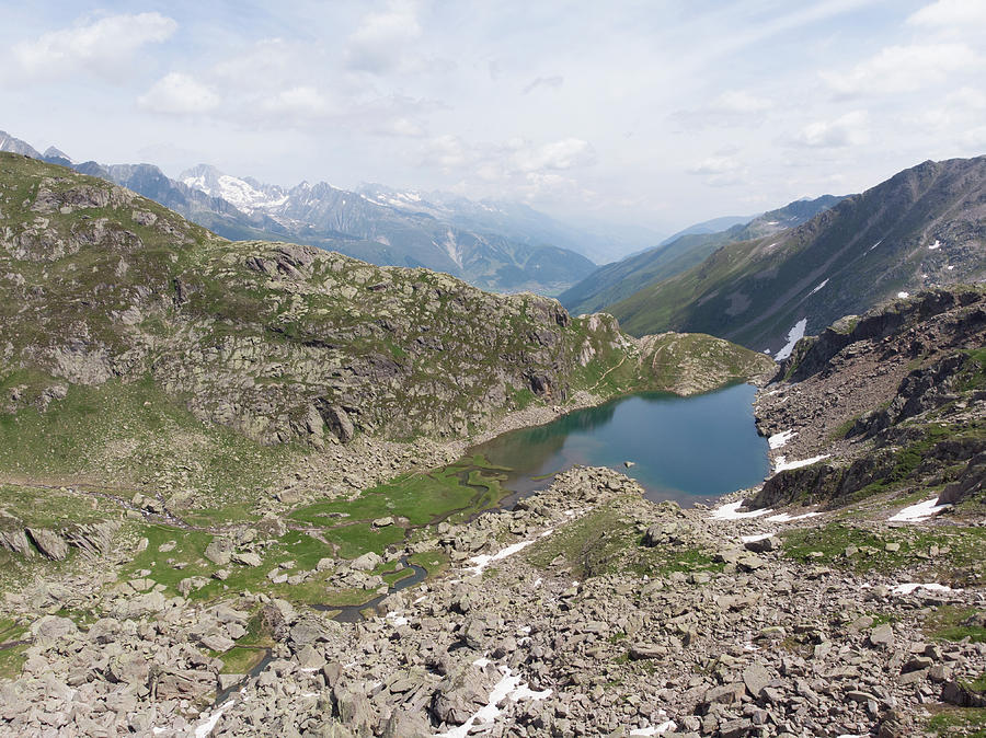 Aerial View Of An Alpine Lake In Switzerland Photograph by Cavan Images ...