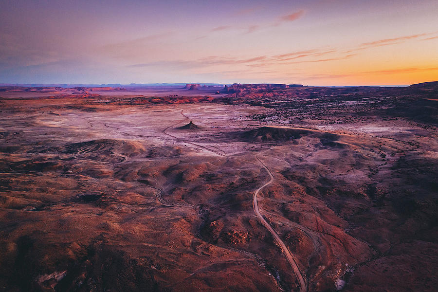 Nature Photograph - Aerial View Of An Unpaved Road In A Arizona Desert In The Morning by Cavan Images