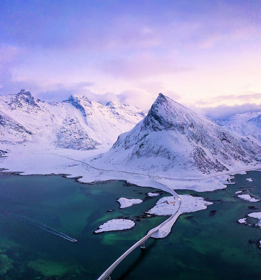 Aerial View Of Snowy Peak Of Volandstind At Sunset, Flakstad, Norway ...