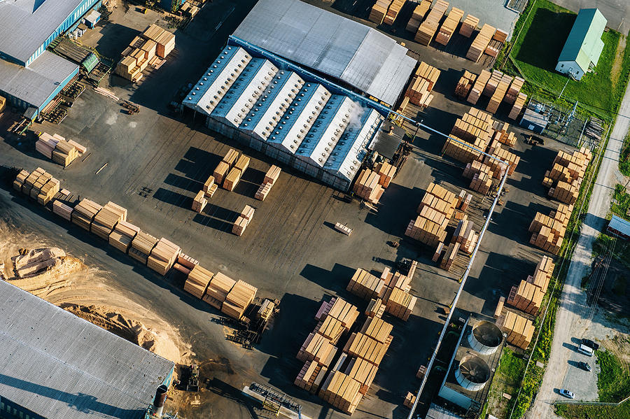 Nature Digital Art - Aerial View Of Stacked Planks In Timber Yard by Pete Saloutos