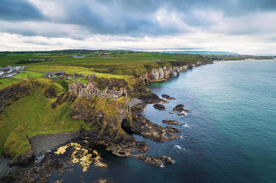 Aerial view of the medieval Dunluce Castle ruins, Ireland Photograph by ...