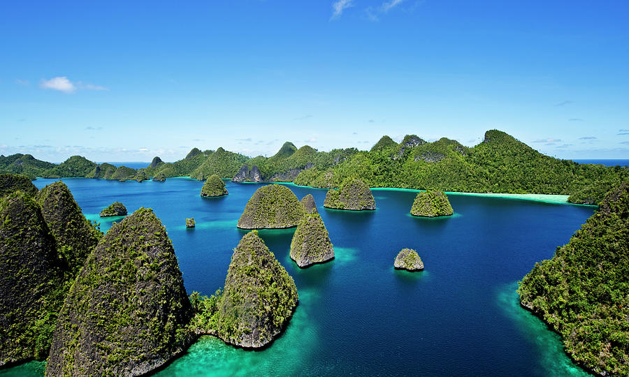 Aerial View Of Wayag Islands  With Blue by James Morgan