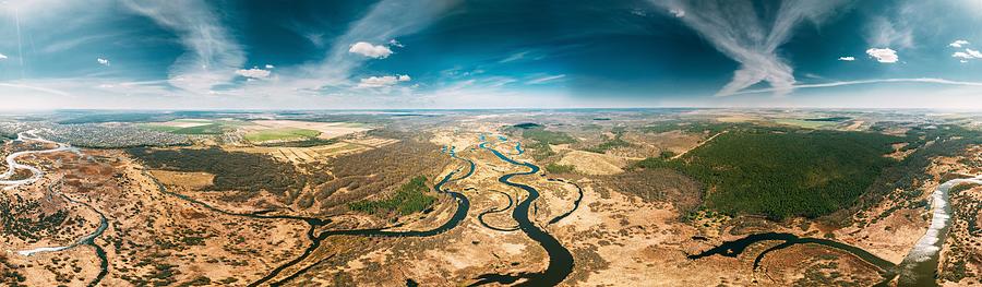 Nature Photograph - Aerial View River And Green Forest by Ryhor Bruyeu