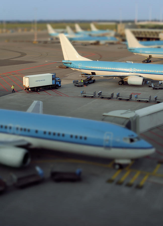 Aeroplanes At Airport Photograph by Eschcollection
