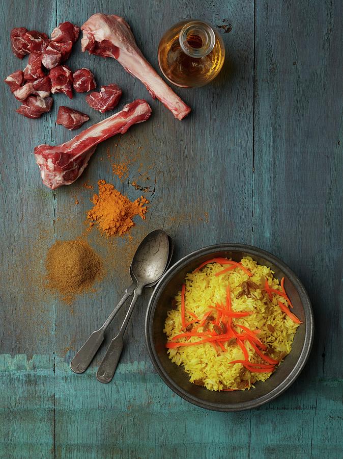 Afghan Rice With Chicken, Carrots, Raisins, Spices And Lamb Photograph ...