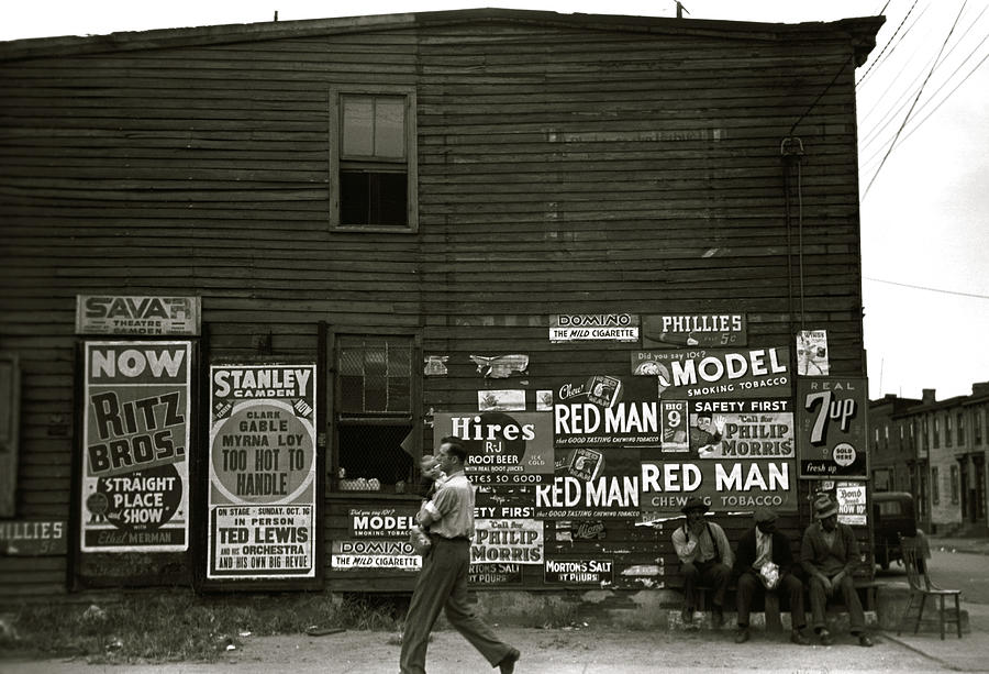 Sign Painting - African American Men sit outside of retail establishment watching a  man walks by holding an infant by Unknown