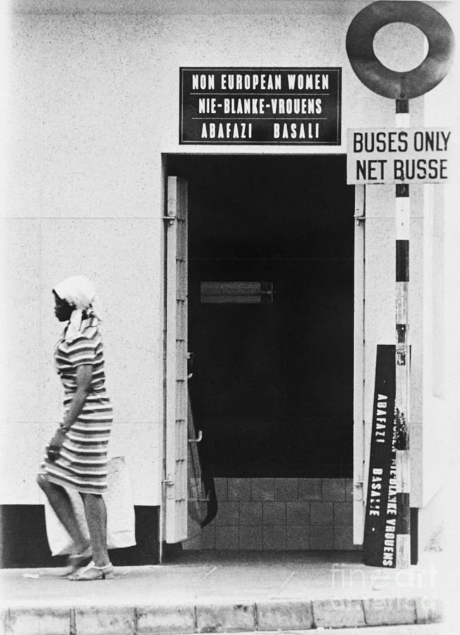 African Woman Leaves Non-white Toilet Photograph by Bettmann