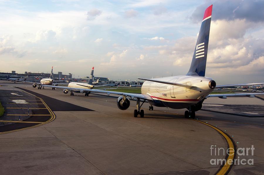 Aircraft Taxiing At Philadelphia Airport Photograph by Mark Williamson/science Photo Library