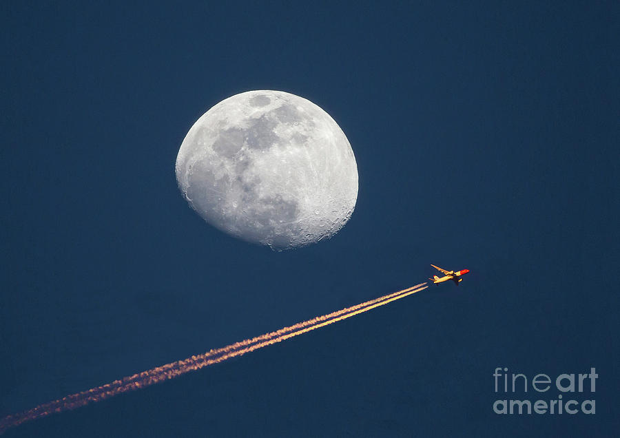 Airliner and Waxing Gibbous Moon by Kevin McCarthy Airliner and Waxing Gibbous Moon by Kevin McCarthy