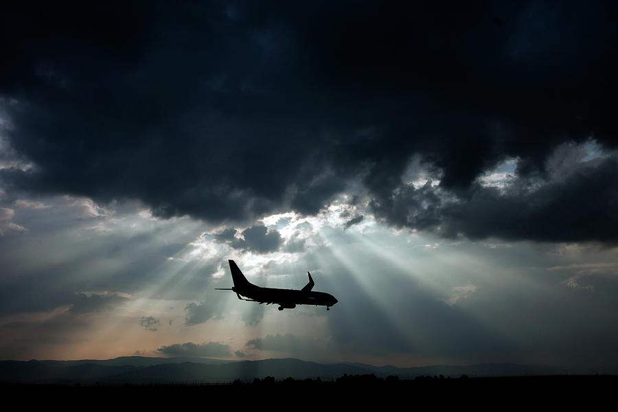 Nature Photograph - Airplane And Stormy Clouds by Shunichi Yoneyama
