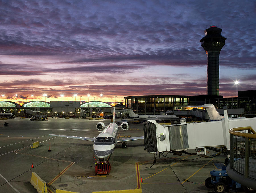 Airplane At Ohare Airport At Night Photograph by Jon Shireman