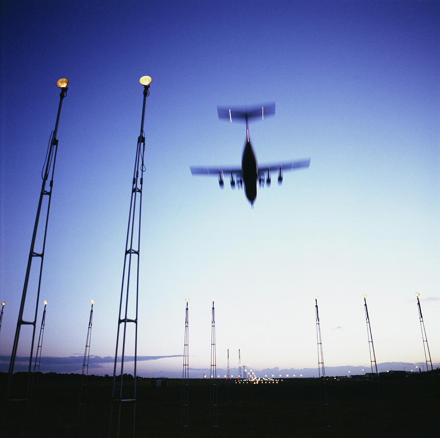 Airplane Landing Photograph by Eric Oconnell