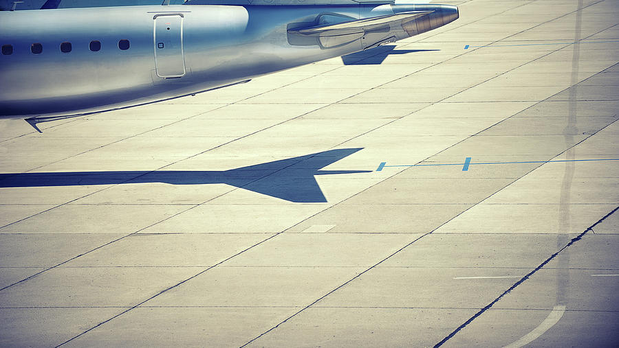 Airplane Tail And Airplane Tail Shadow Photograph by Elisabeth Schmitt