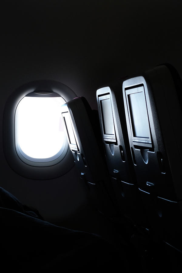 Airplane Window And Vehicle Seats During Flight Photograph by Cavan ...