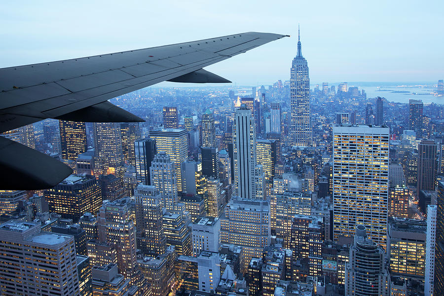 Airplane Wing Over New York Photograph by Buena Vista Images