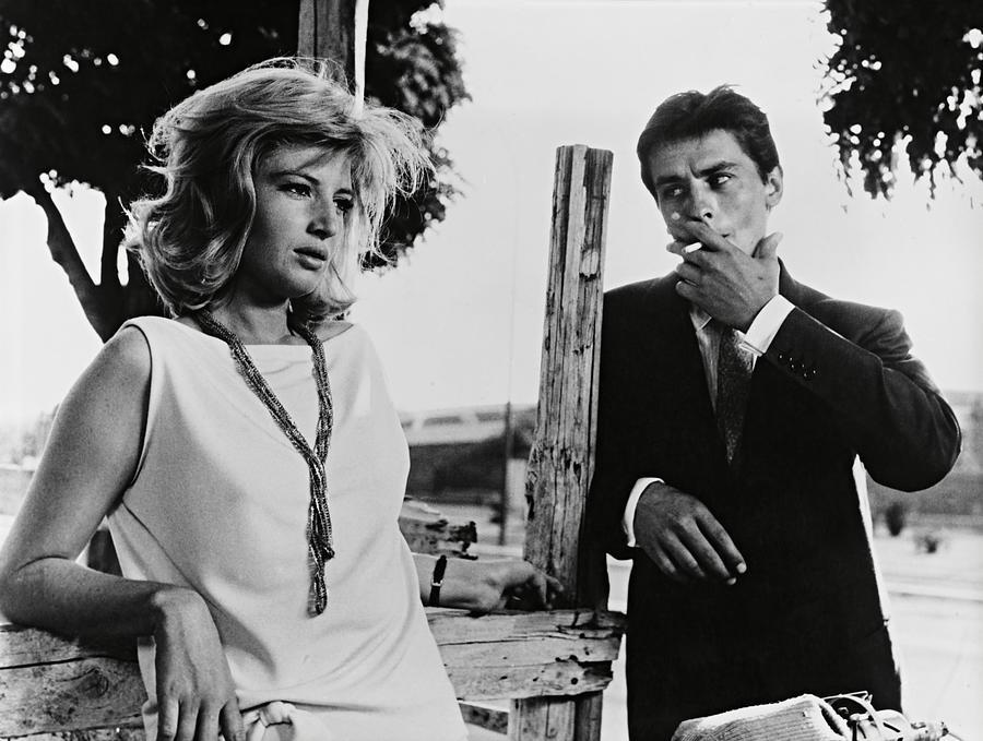 ALAIN DELON and MONICA VITTI in THE ECLIPSE -1962- -Original title L ECLISSE-. Photograph by Album