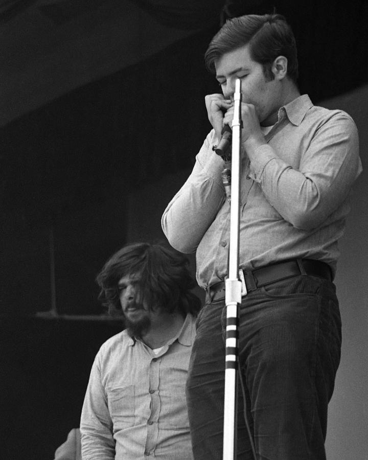 Alan Wilson Playing Harmonica During Canned Heat Photograph by Globe ...