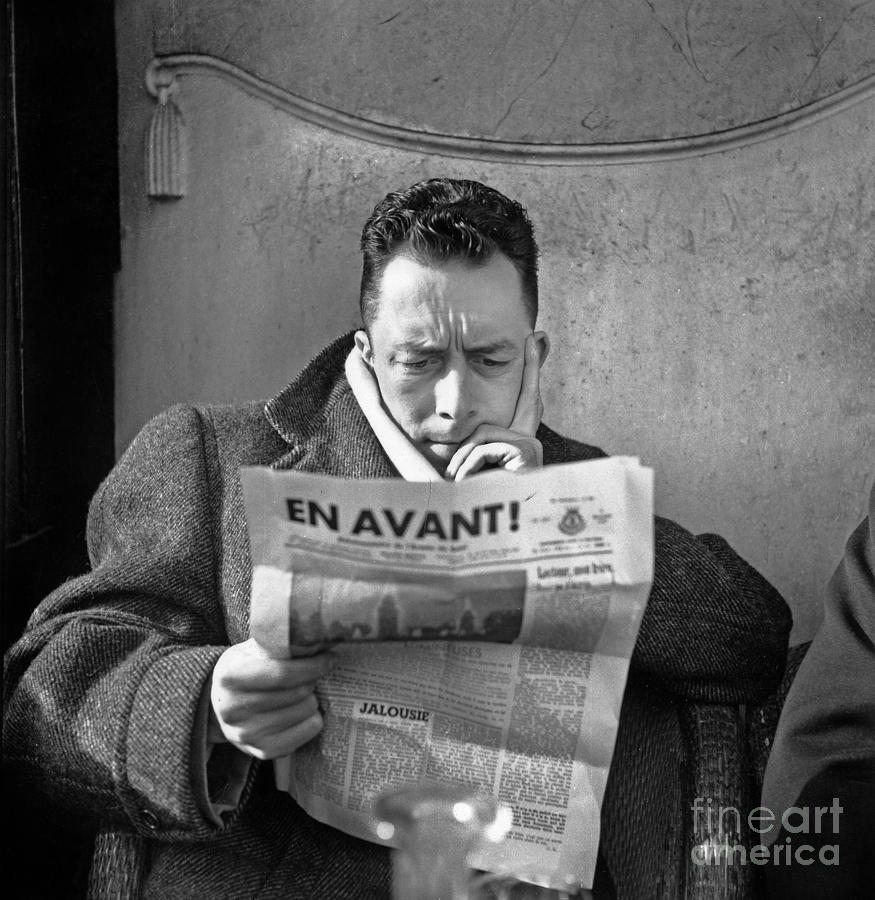 Portrait Photograph - Albert Camus Reading En Avant In 1945 by French School