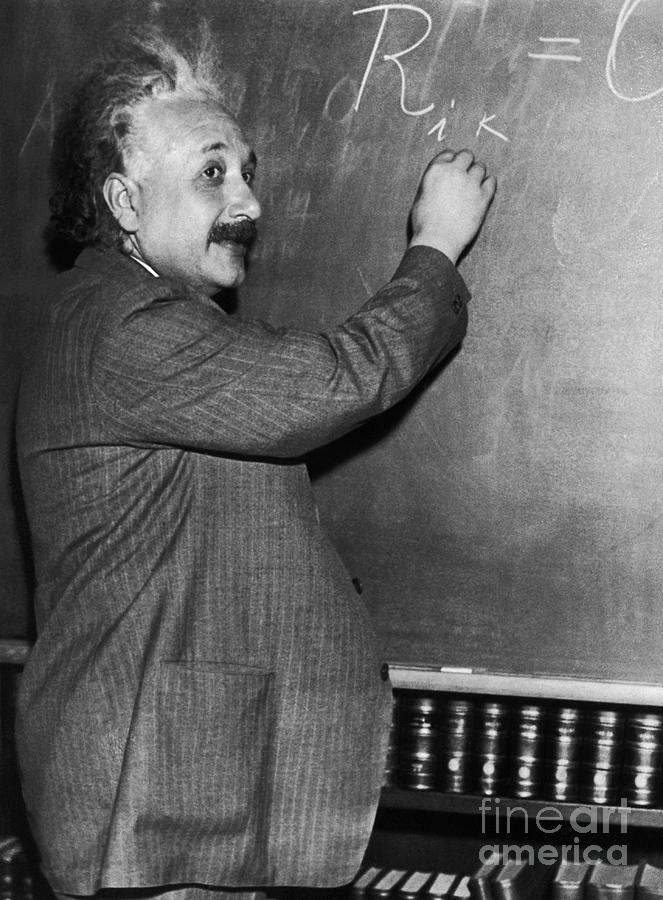 Albert Einstein Photograph - Albert Einstein Writing Mathematic by Bettmann