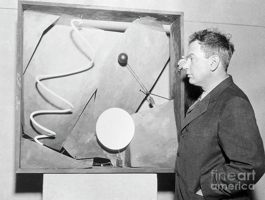 University Of Chicago Photograph - Alexander Calder Showing His Piece by Bettmann