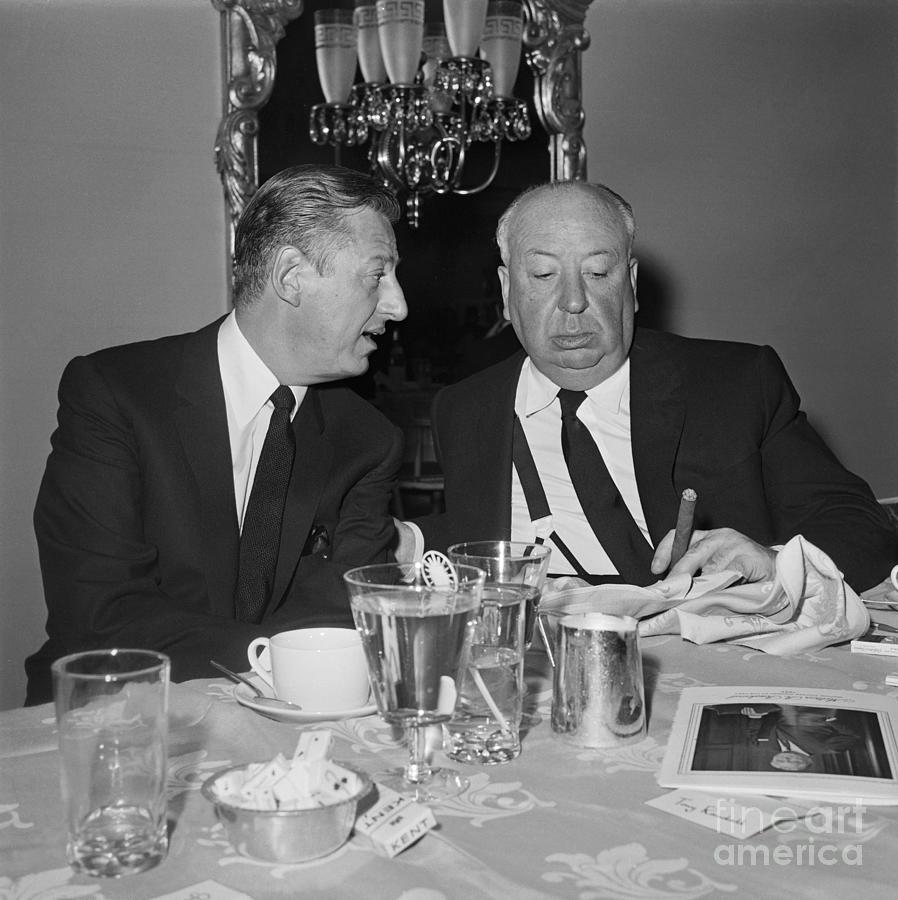 Alfred Hitchcock And Lew Wasserman Photograph by Bettmann