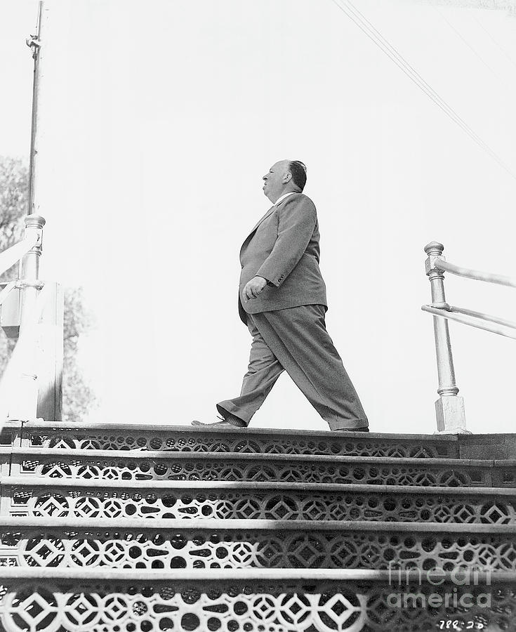 Alfred Hitchcock Walking At Top Of Steps Photograph by Bettmann