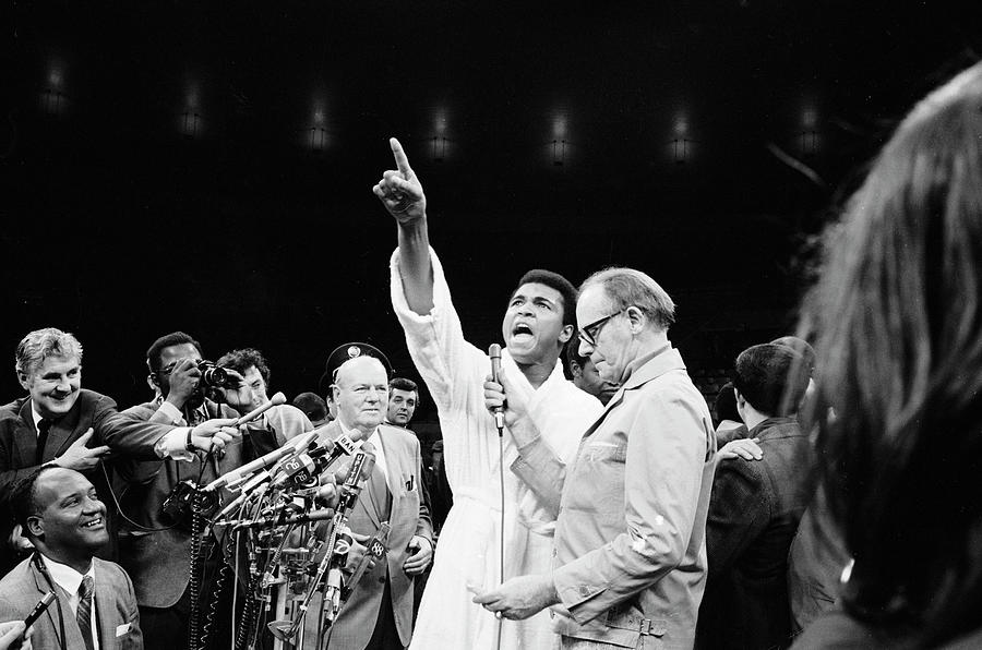 Black And White Photograph - Ali Talks To The Press by John Shearer