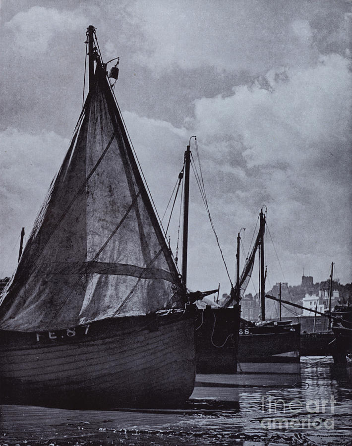 All The Fishing Fleet Of Slender Spars Range At Their Moorings, Veer With Tide About Photograph by Harold Burdekin