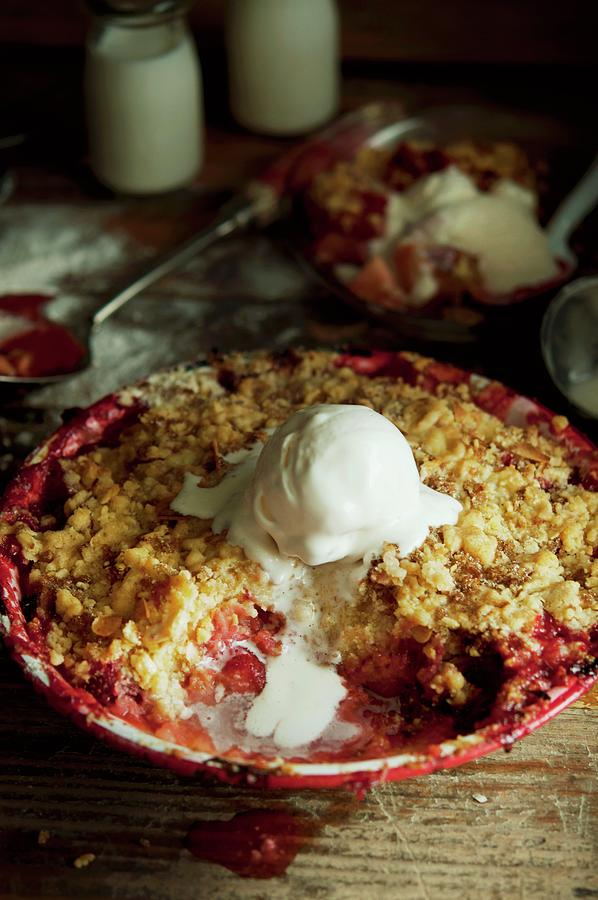 Almond And Berry Crumble With Vanilla Ice Cream Photograph by Kristy Snell