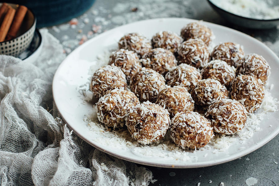 Almond And Date Energy Balls With Grated Coconut Photograph by Kate Prihodko