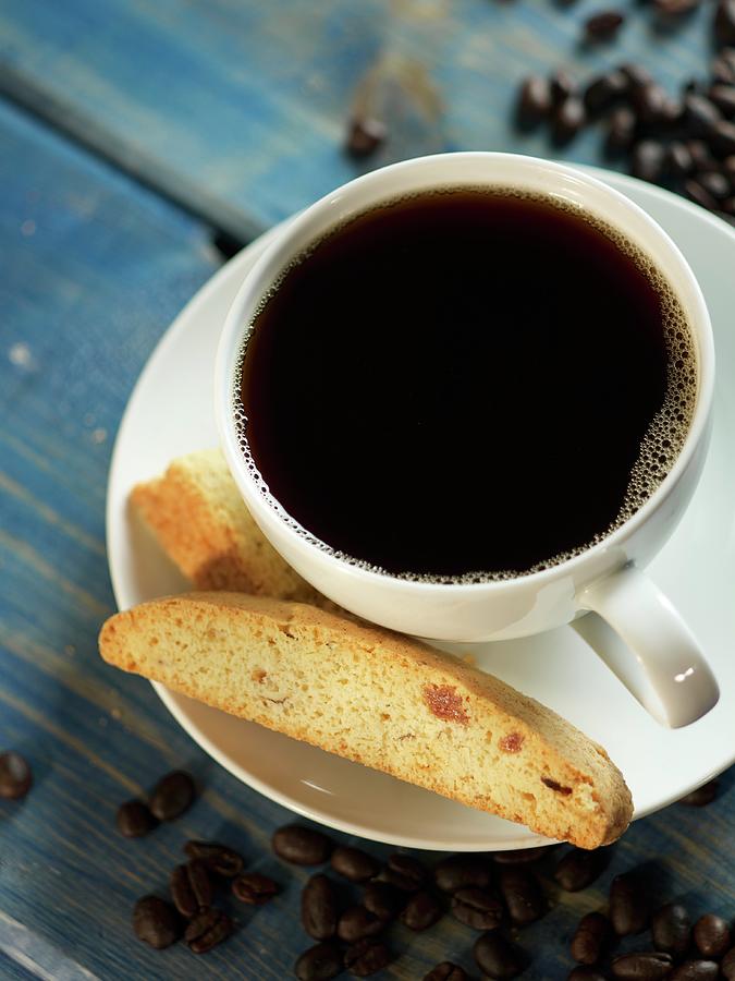 Almond And Orange Biscotti And A Cup Of Coffee Photograph by Brenda Spaude