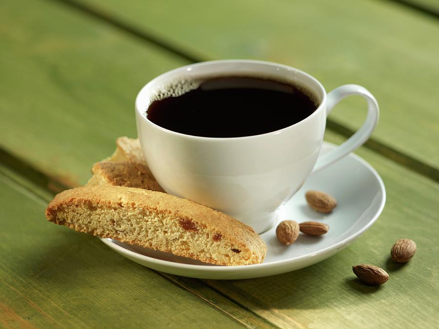 Almond Biscotti And A Cup Of Coffee Photograph by Brenda Spaude