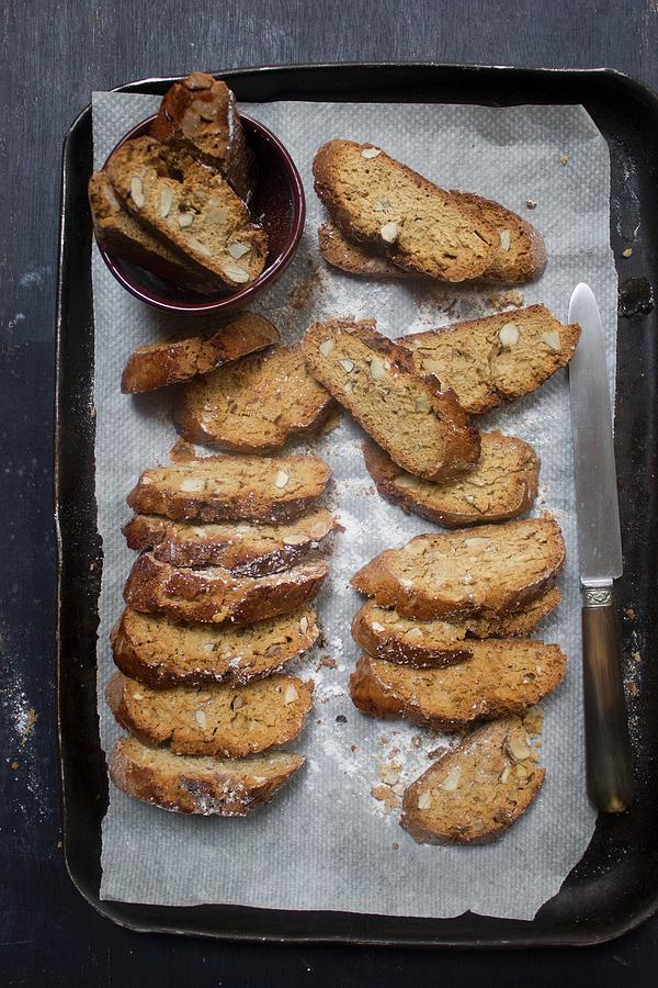 Almond Biscotti On A Baking Tray Photograph by Patricia Miceli