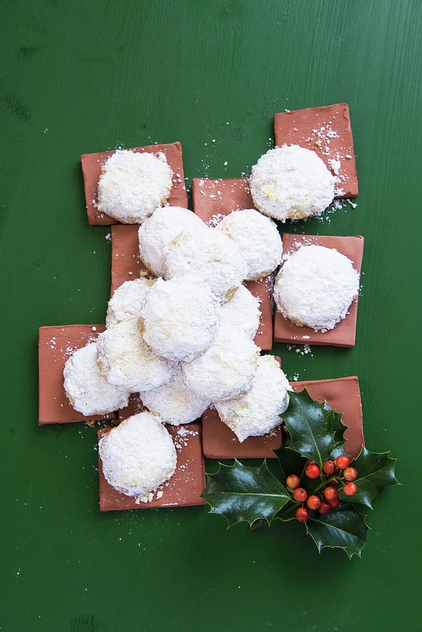 Almond Biscuits Dusted With Icing Sugar For Christmas Photograph by Veronika Studer