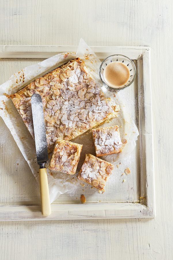 Almond Cake On Baking Paper Photograph by Veronika Studer
