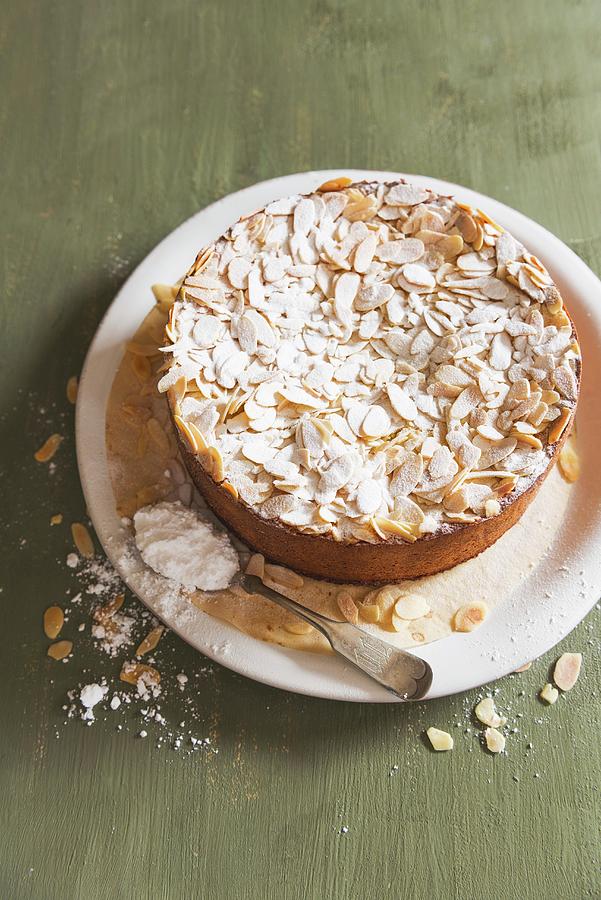 Almond Cake With Icing Sugar Photograph by Veronika Studer
