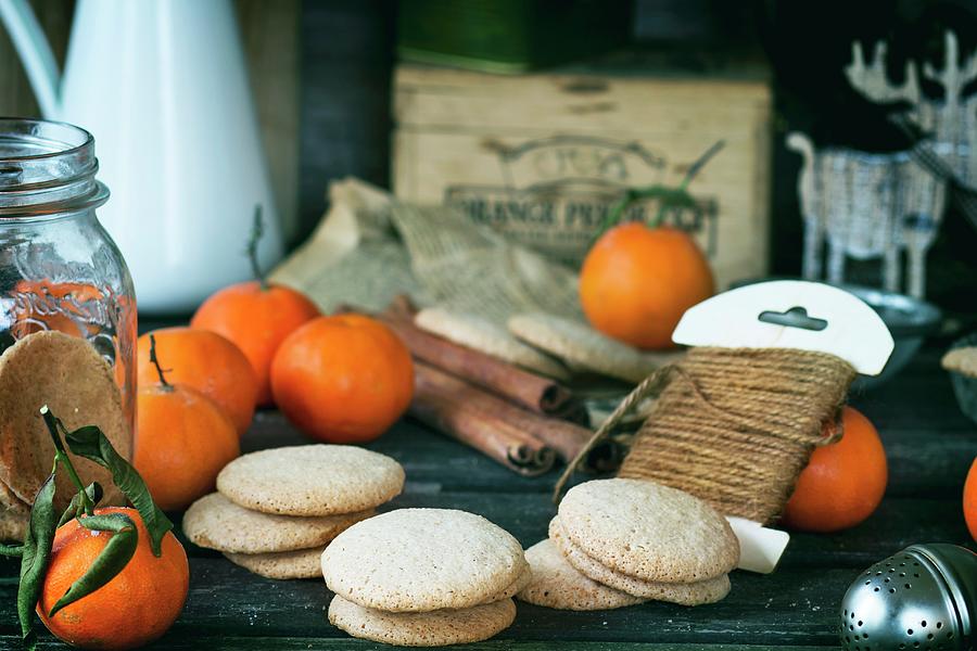 Almond Cookies And Mandarins christmas Photograph by Natasha Breen
