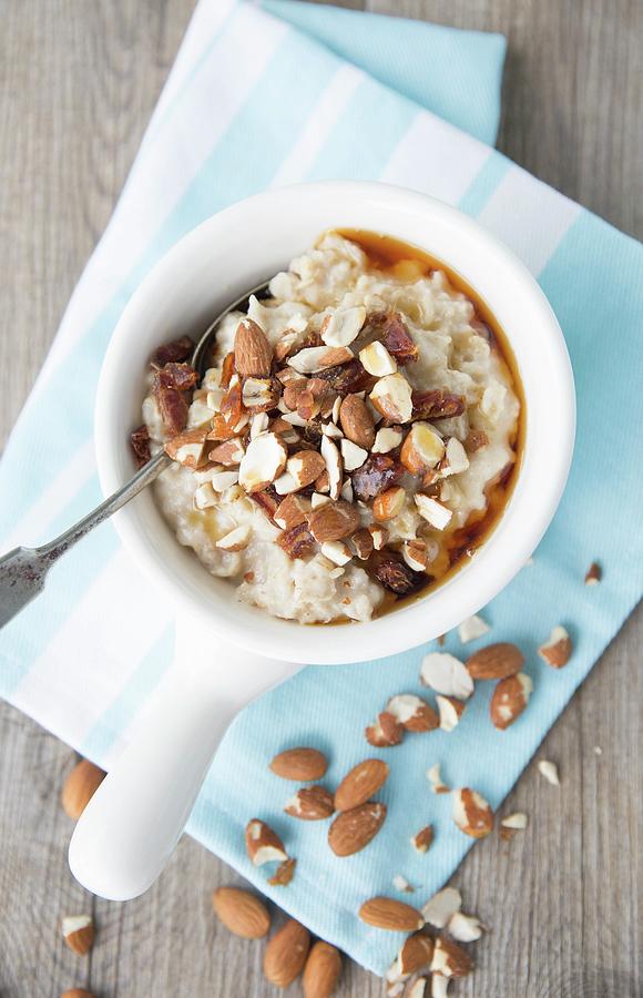 Almond, Date And Maple Syrup Oats Photograph by Elle Brooks