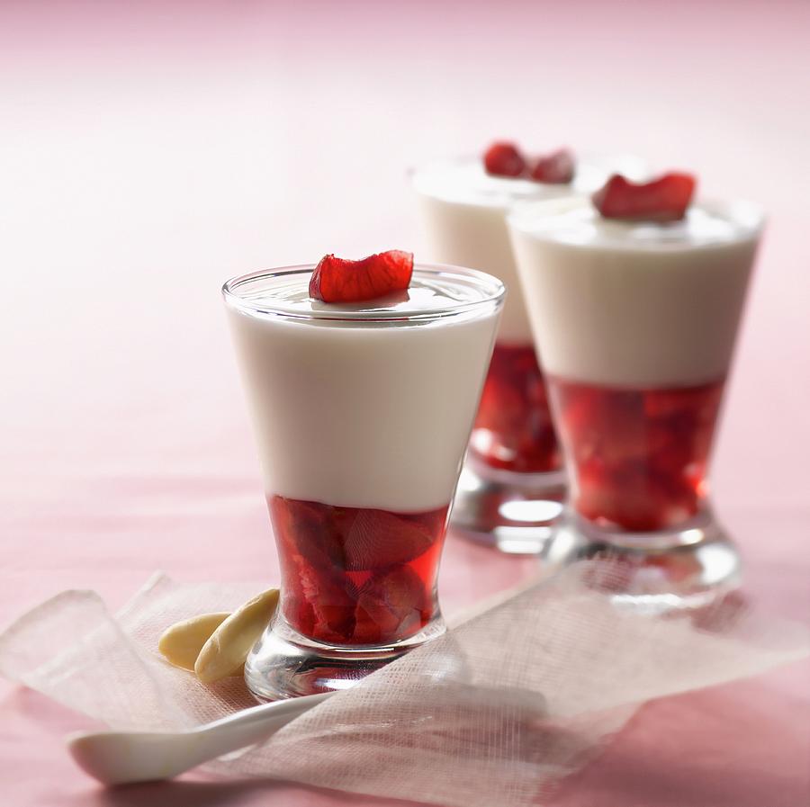 Almond-flavored Yoghurt With Cherry Jelly Photograph by Studio