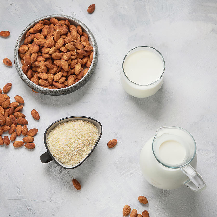 Almond Milk, Almond Flour And Almonds Photograph by Tatjana Baibakova
