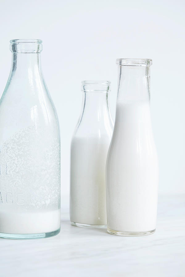 Almond Milk In Glass Bottles Photograph by Atelier Mai 98
