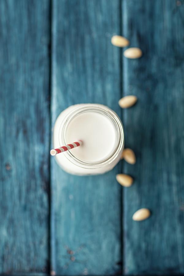 Almond Milk In Glasses With Straws Photograph by Nika Moskalenko