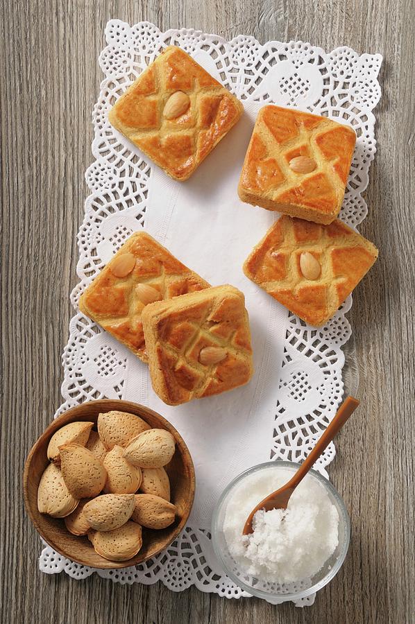 Almond Slices, Sugar And Almonds On A Doily Photograph by Jean-christophe Riou