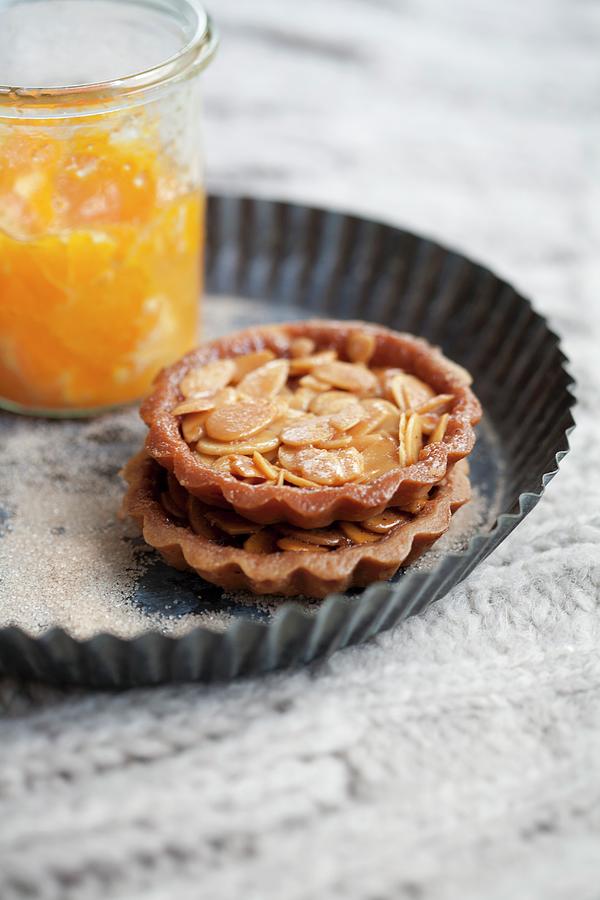 Almond Tartlets For Christmas Photograph by Martina Schindler