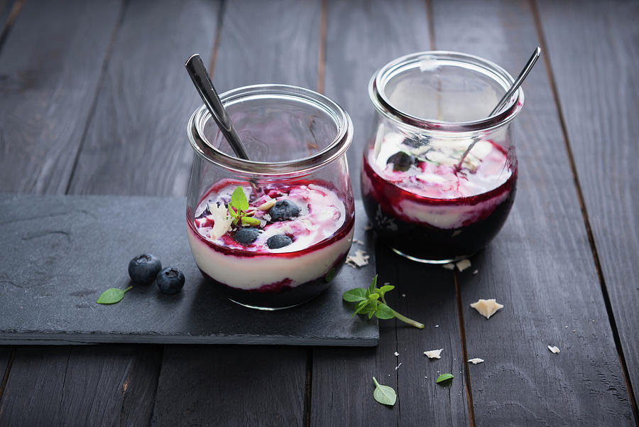 Almond Yogurt With Blueberry Compote In A Glass Photograph by Kati Neudert