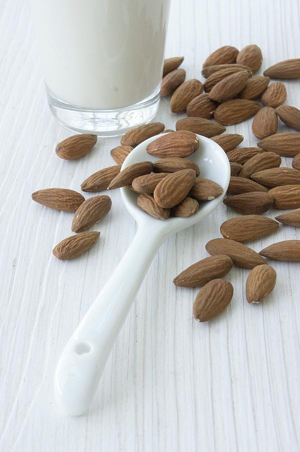Almonds And Almond Milk Photograph by Martina Schindler